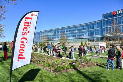 Attendees plant native species at the new pollinator garden at Life's Good Earth Day Community Fair, Monday, April 22, 2024, at the LG Electronics North American Innovation Campus in& Englewood Cliffs, NJ.  Earning a Certified Wildlife Habitat® certification through the NWF, LG's garden is outfitted with native plants, designed to attract a mixture of pollinators, such as bees, butterflies, moths, and beetles, which will encourage biodiversity, plant growth, clean air, and support wildlife.  (Diane Bondareff/AP Images for LG Electronics)