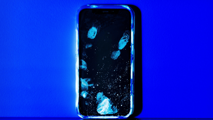 UV photo of a smartphone covered in fingerprints