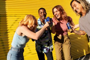 Four people with White Claw™ 0% Alcohol