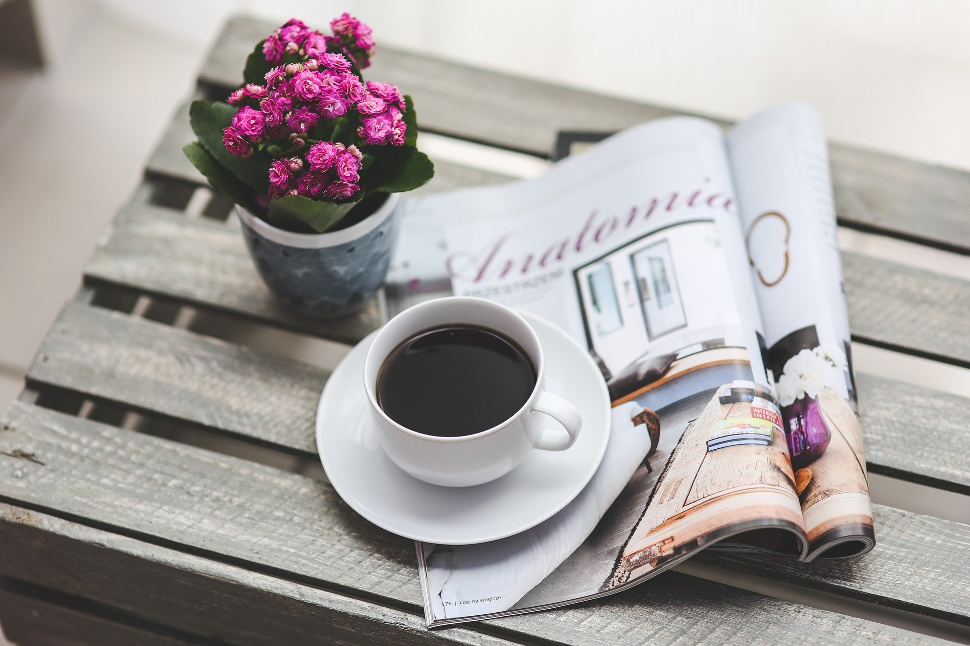 magazine with a cup of coffee