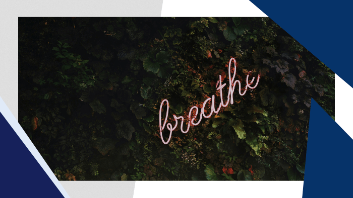 a neon sign with the word breathe