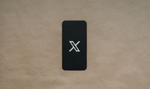 Smartphone displaying the X logo