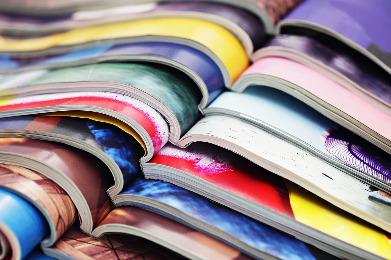 Stack of open magazines