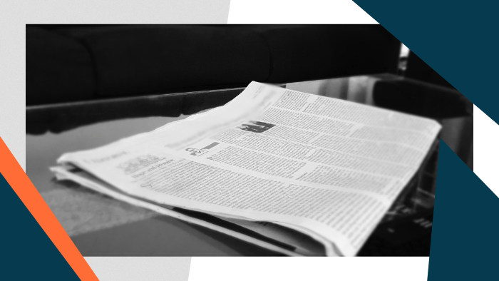 Folded newspaper on a desk